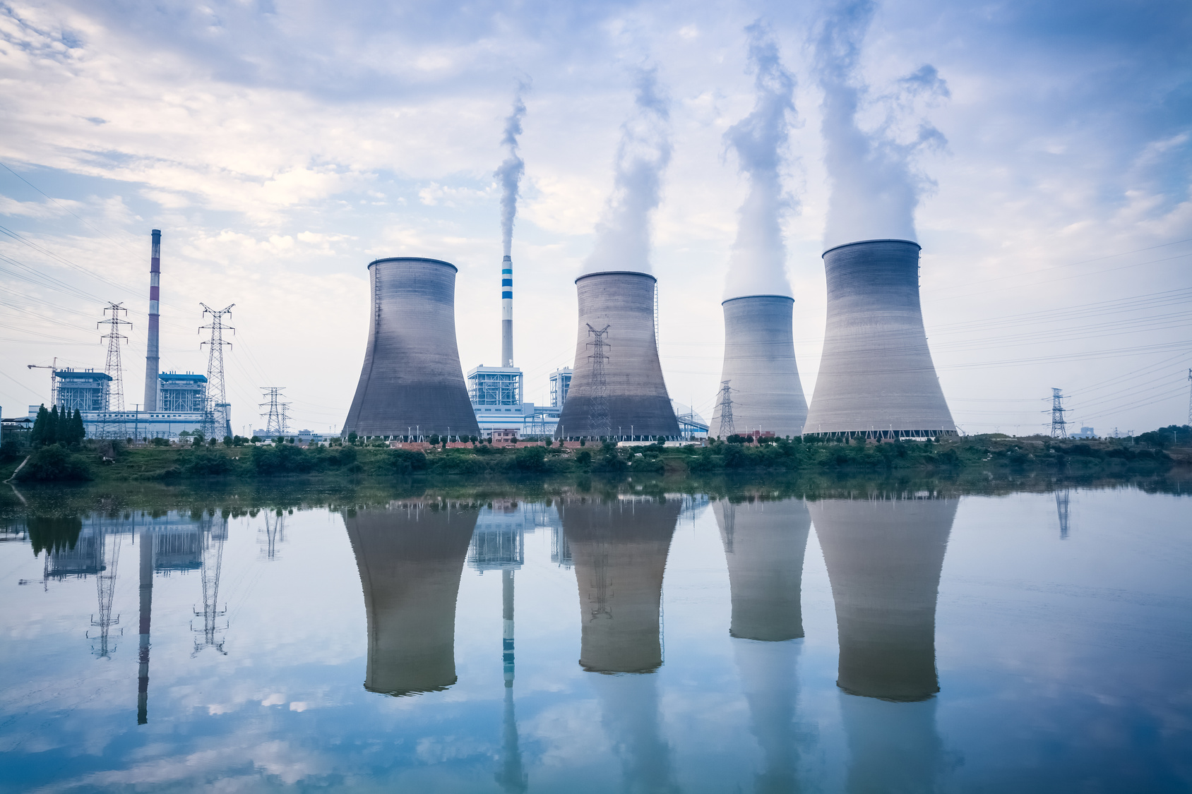 coal-fired power plant , cooling towers and river surface reflection , jiangxi , China